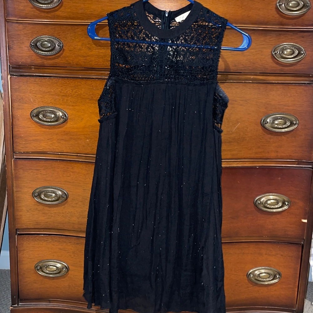 Short black dress.